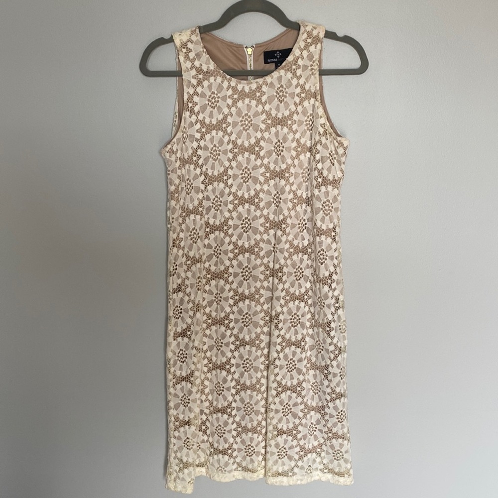 Lace dress with nude underlay